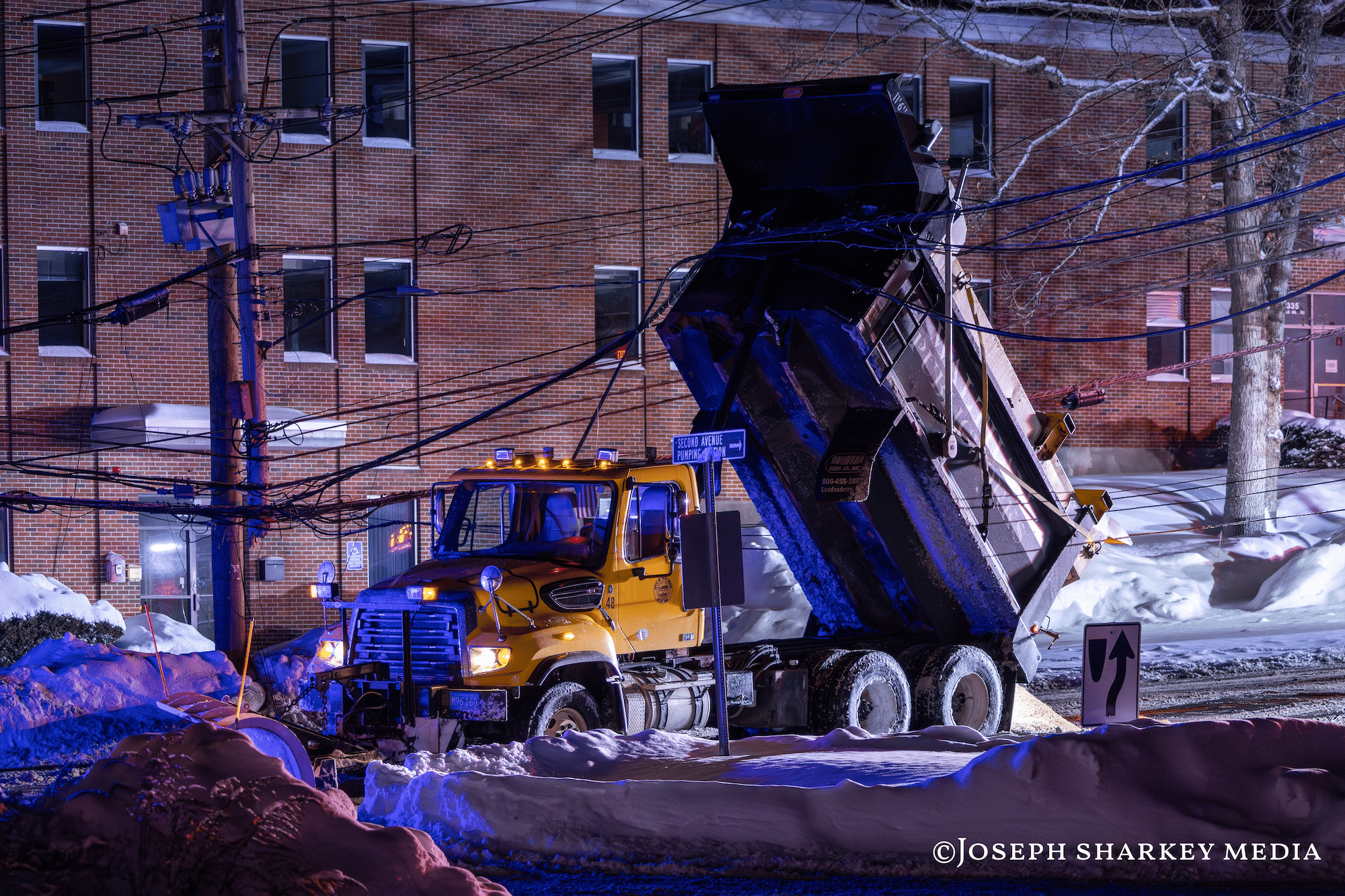 Second Avenue shut down after dump truck collides with utility wires ...