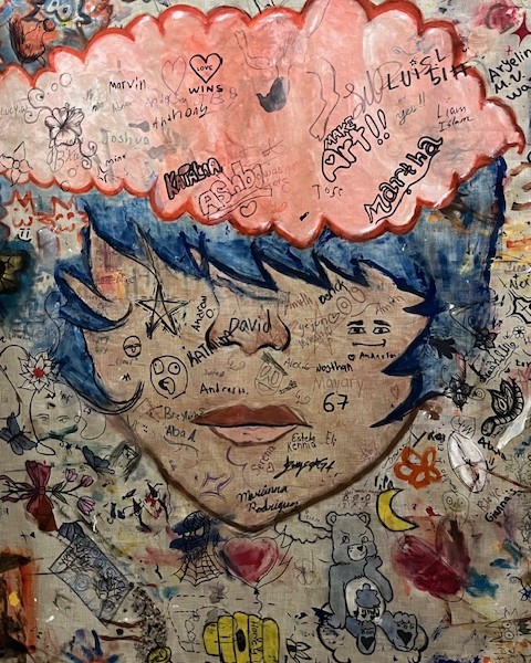 Mural welcomes visitors upstairs in the library. Photo by Steve Milmore.